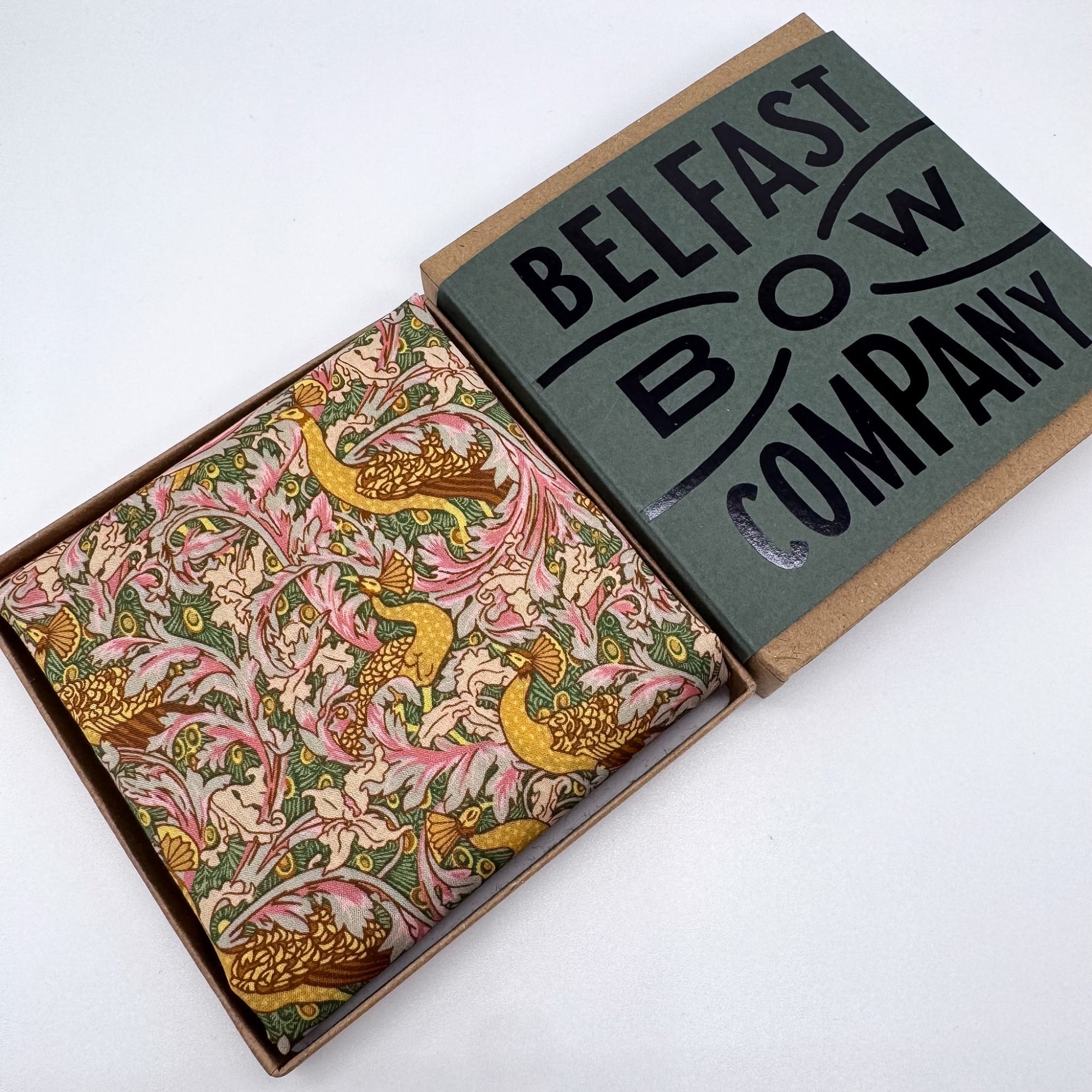 Liberty pocket sqaure in mustard yellow and green peacock print by the belfast bow company