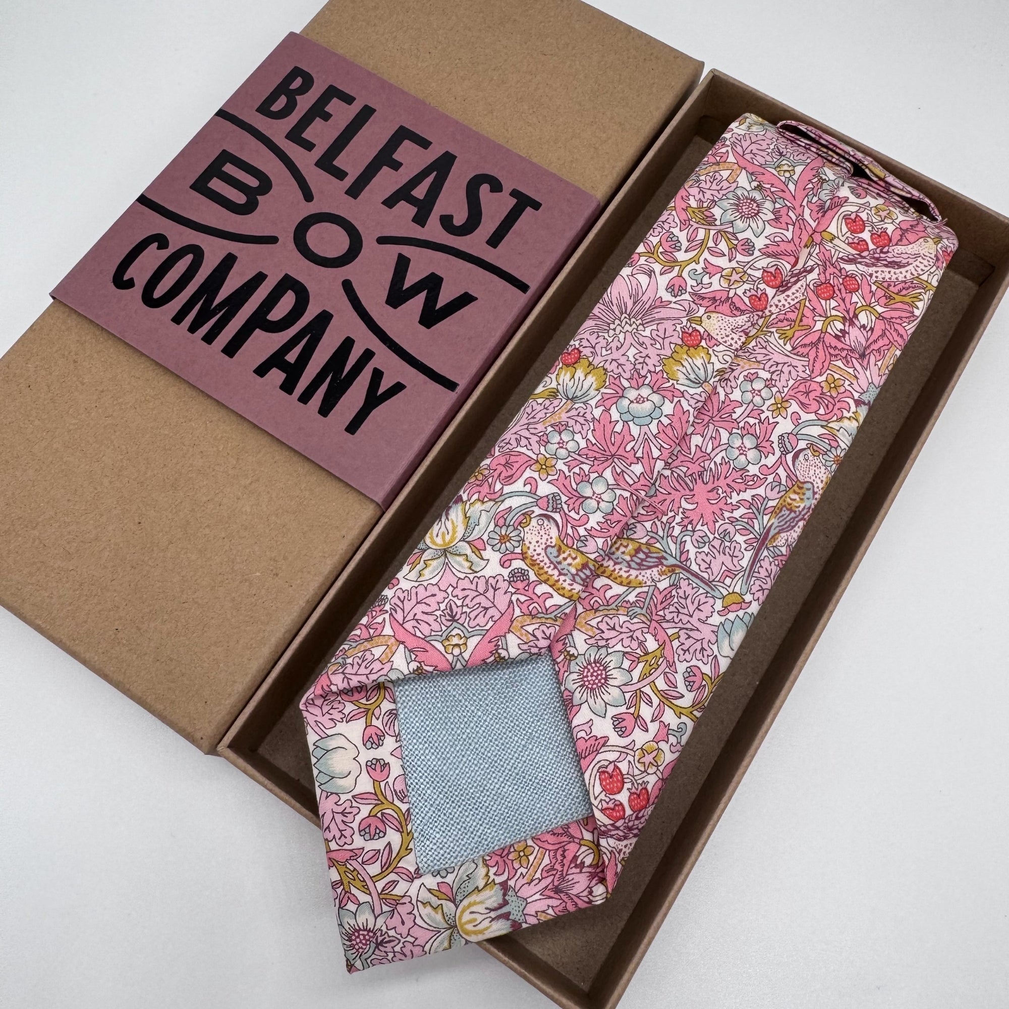 Pink liberty tie in strawberry thief print by the belfast bow company