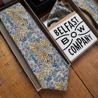 Blue and yellow floral wedding accessories for the grooms party by the belfast bow company