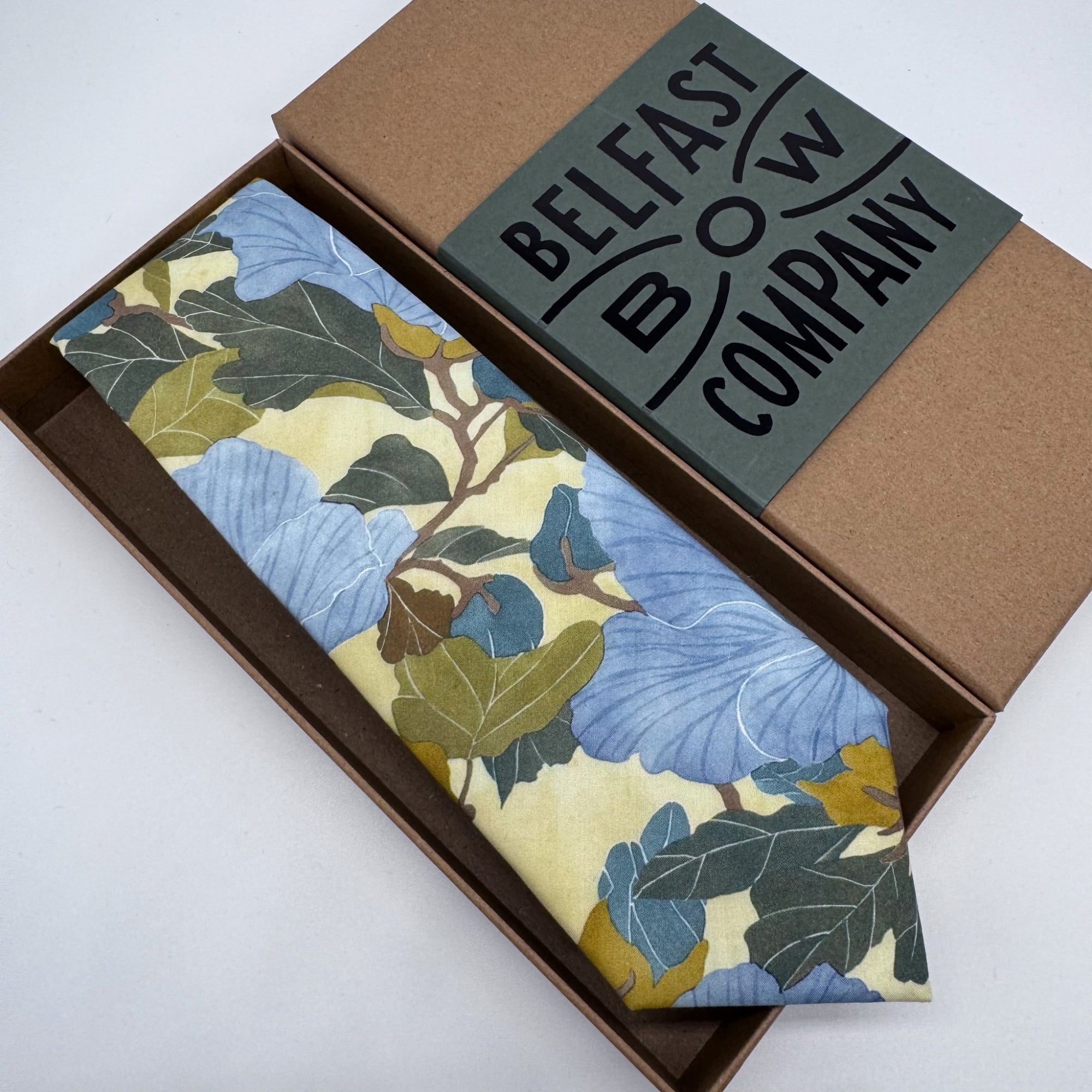Blue and butter yellow floral tie by the belfast bow company