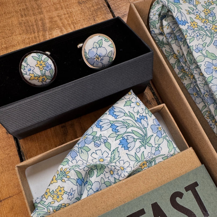 matching pocket and cufflinks in pale blue floral by the belfast bow company
