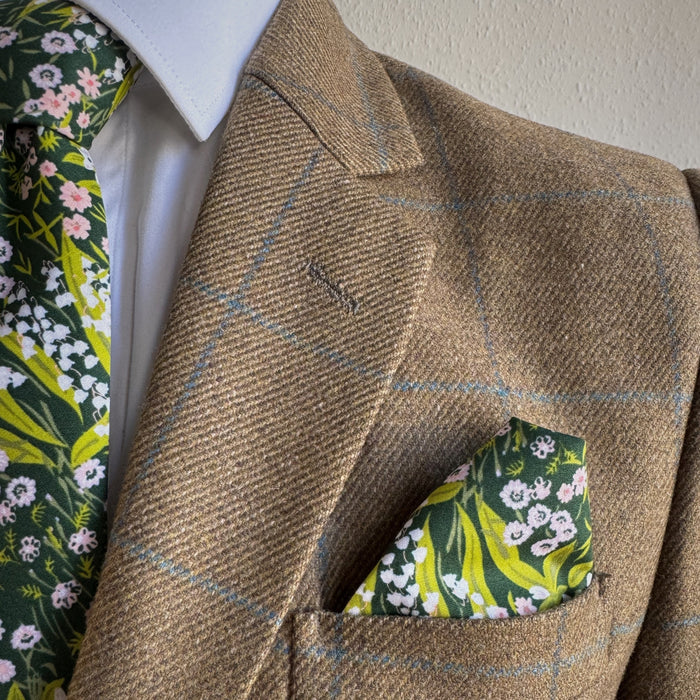 Matching floral tie and pocket square in green and pink floral by the belfast bow company
