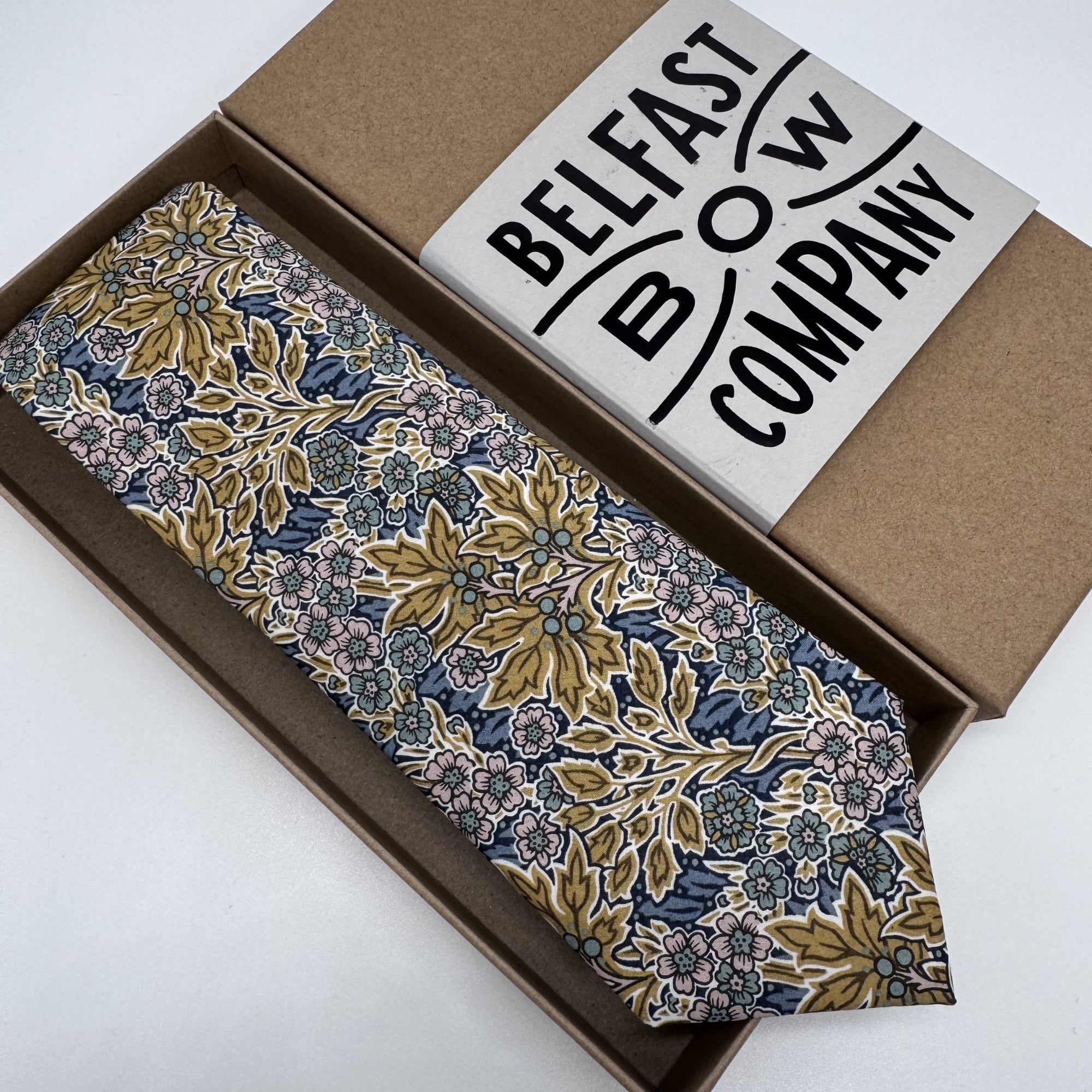 Mustard yellow and blue floral liberty tie by the belfast bow company