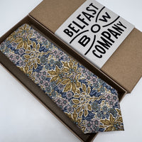 Mustard yellow and blue floral liberty tie by the belfast bow company
