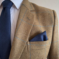 Matching navy tie and pocket square in irish linen by the belfast bow company