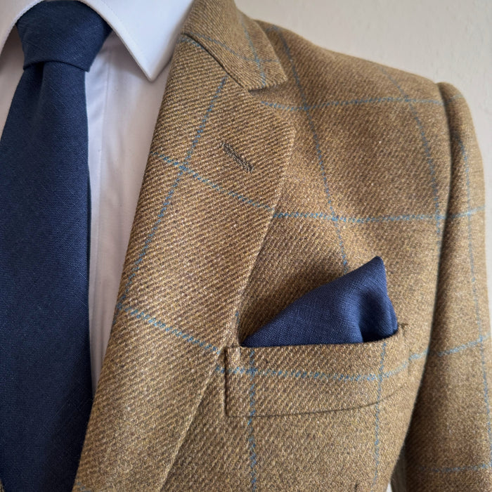 Matching navy tie and pocket square in irish linen by the belfast bow company