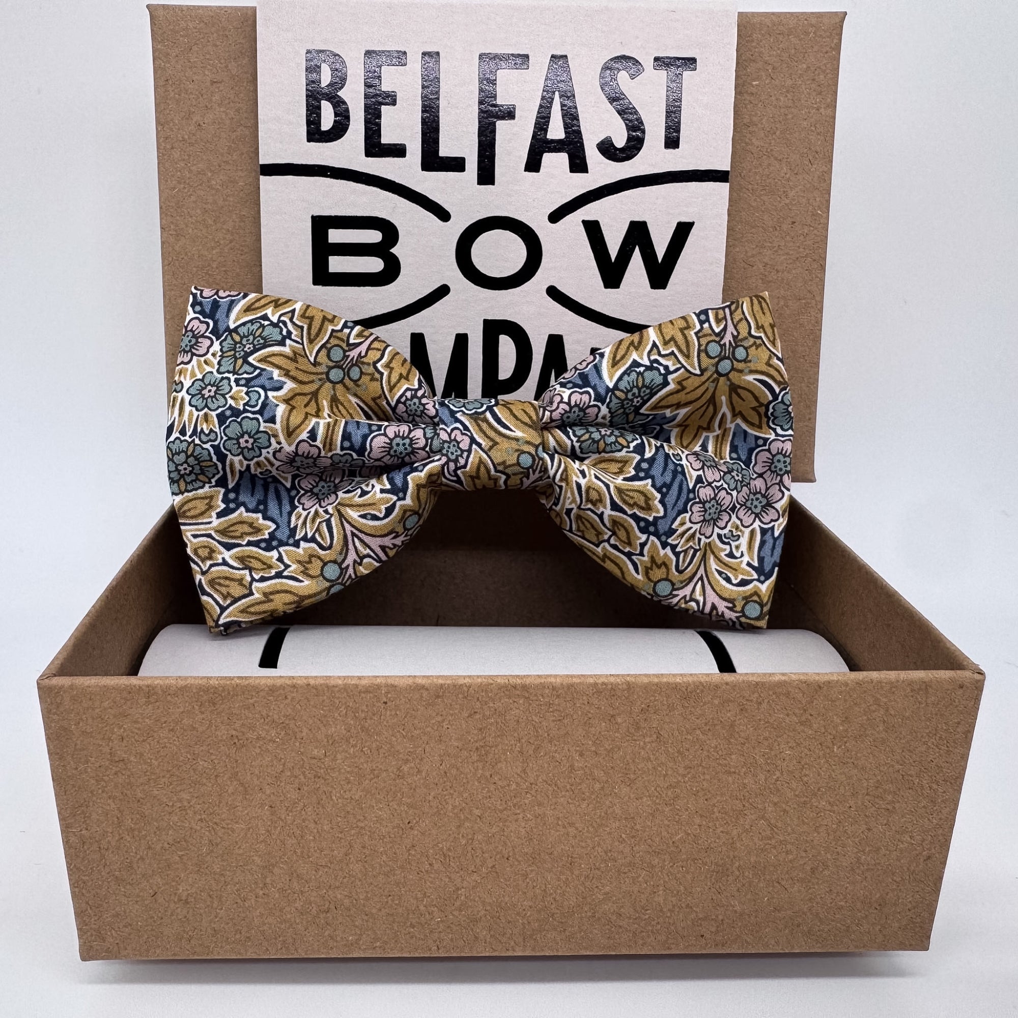 Liberty floral bow tie in mustard yellow and navy blue by the belfast bow company