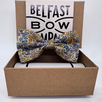 Liberty floral bow tie in mustard yellow and navy blue by the belfast bow company