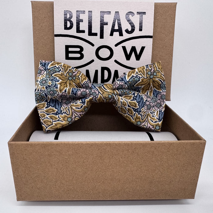 Liberty floral bow tie in mustard yellow and navy blue by the belfast bow company