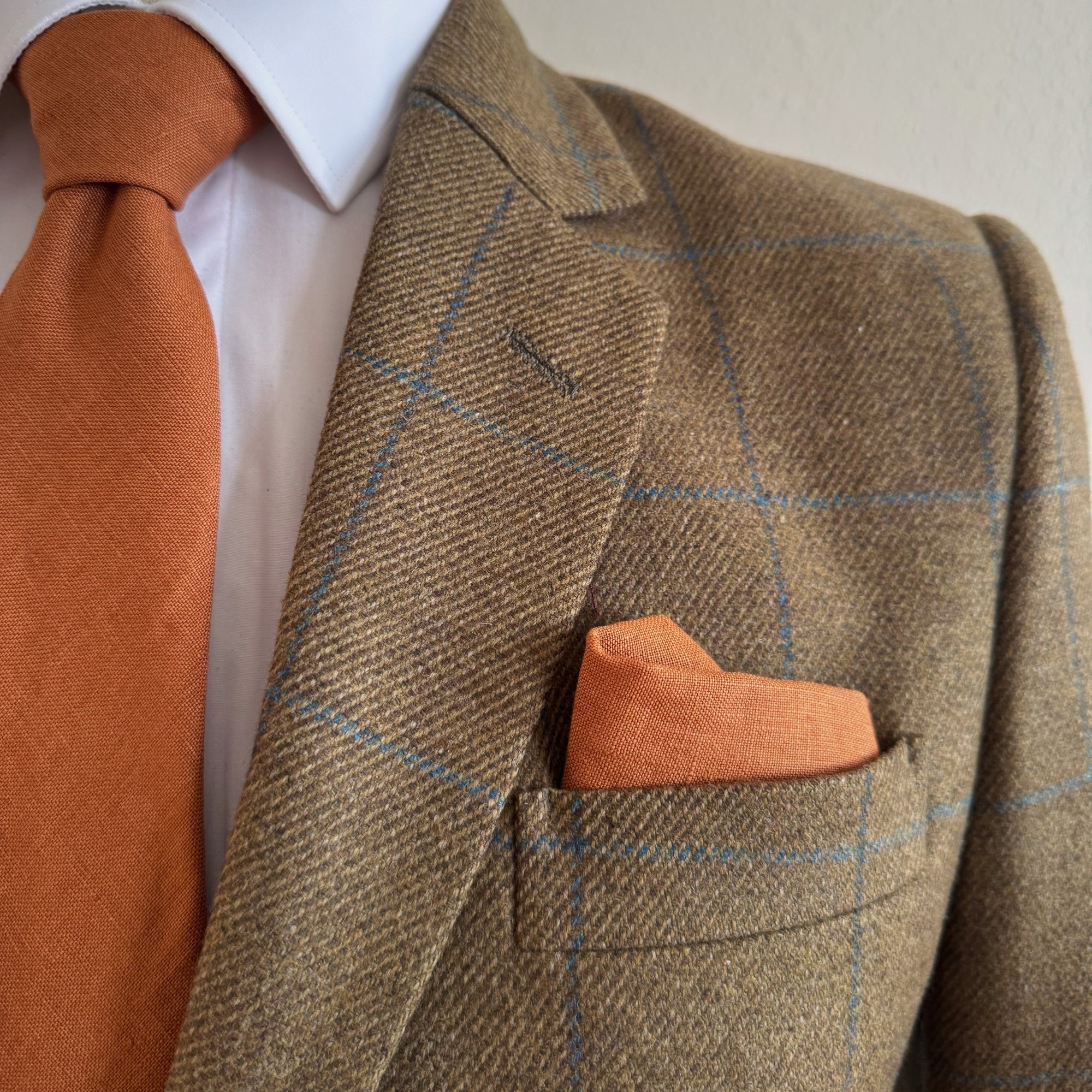 matching pocket square and tie in burnt orange irish linen by the belfast bow company