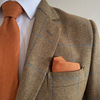 matching pocket square and tie in burnt orange irish linen by the belfast bow company