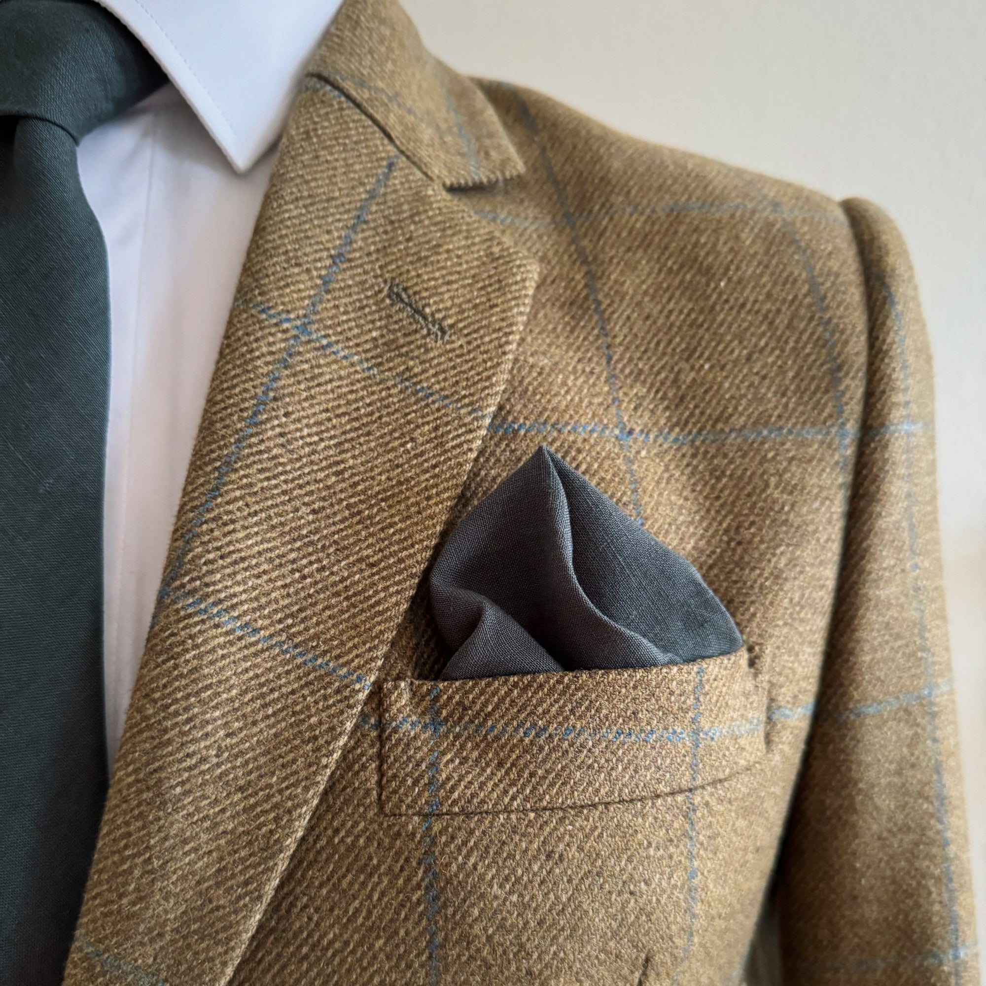 matching linen pocket square and tie in ivy green by the belfast bow company