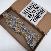 Liberty self-tie bow tie in yellow and blue floral by the belfast bow company