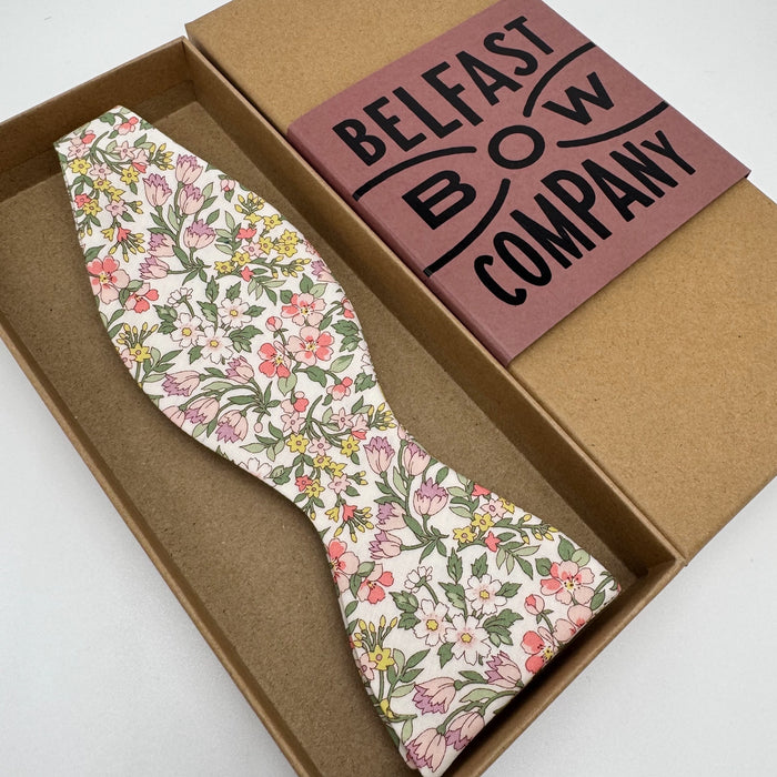 Liberty self-tie bow tie in pink and green floral print by the belfast bow company