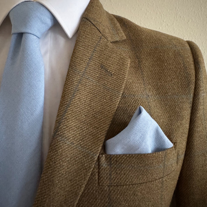 Matching tie and pocket square in blue irish linen by the belfast bow company