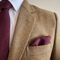 matching linen tie and pocket square in burgundy by the belfast bow company