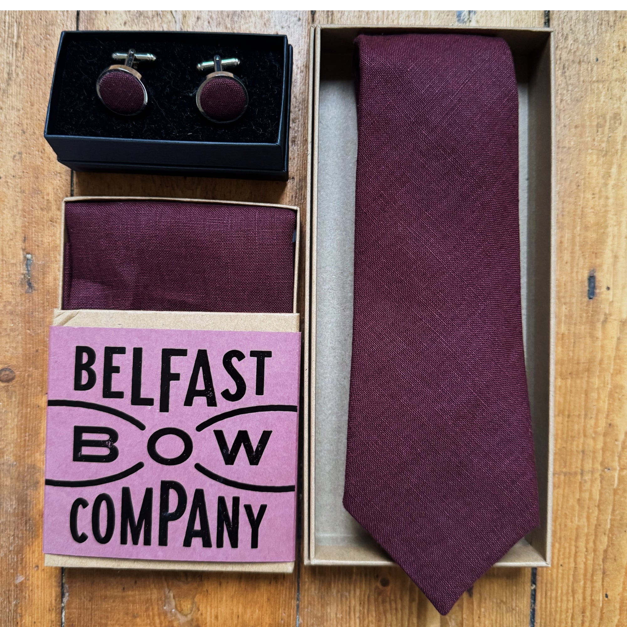 matching tie pocket square and cufflinks in burgundy irish linen by the belfast bow company