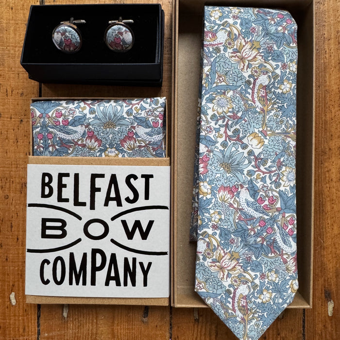 Matching wedding accessories for men in blue strawberry thief by the belfast bow company