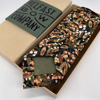 Floral Tie in Black with peach berries and earthy leaves motif by the belfast bow company