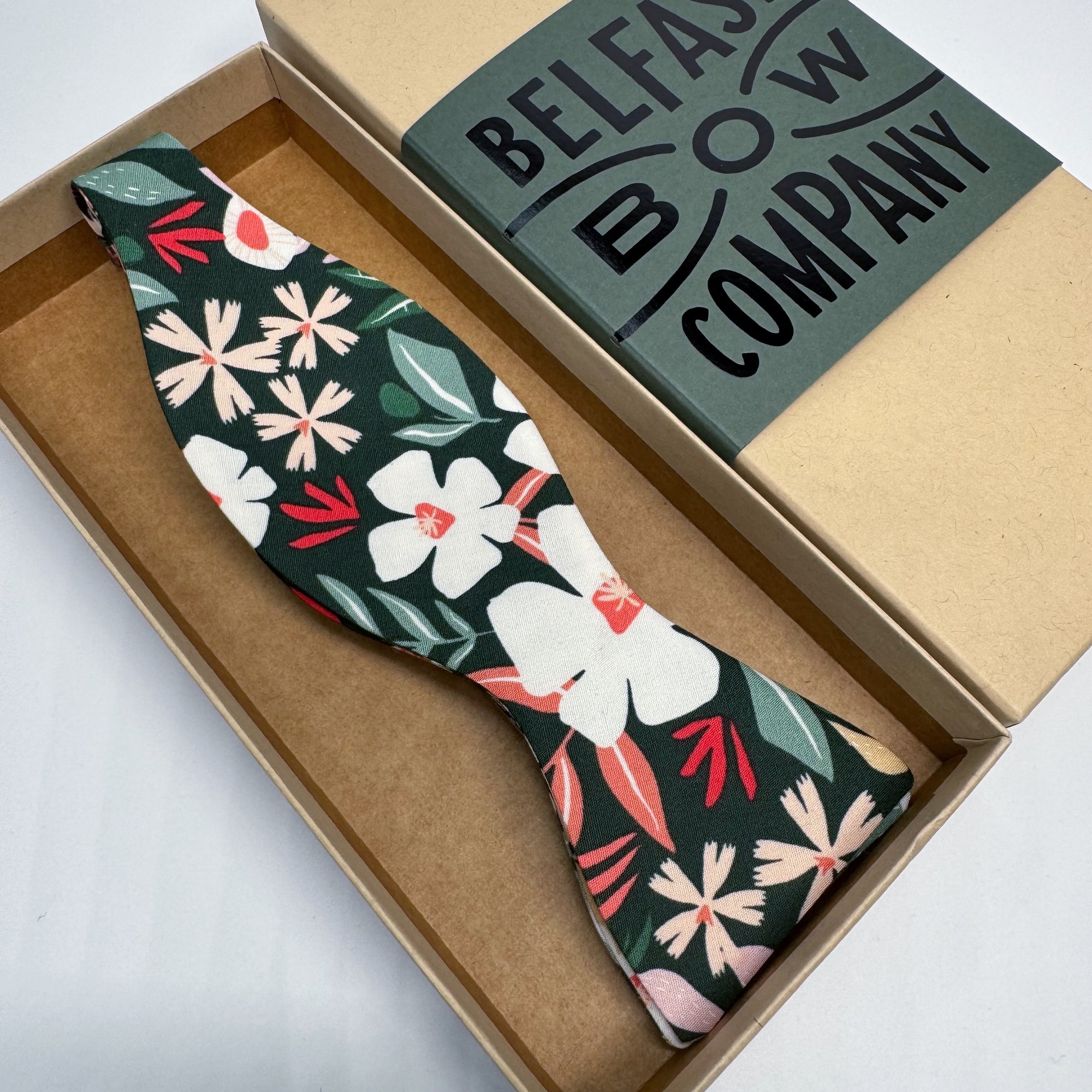 boho blooms self-tie bow tie in tropical green floral by the belfast bow company