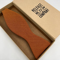 Irish linen self-tie bow tie in burnt orange by the Belfast Bow Company