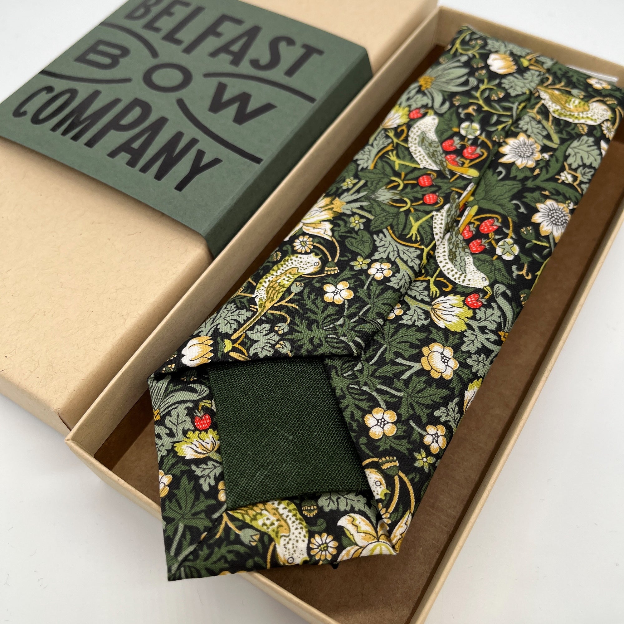 Liberty of London Tie in dark green Strawberry Thief  tipped with Irish Linen by the Belfast Bow Company